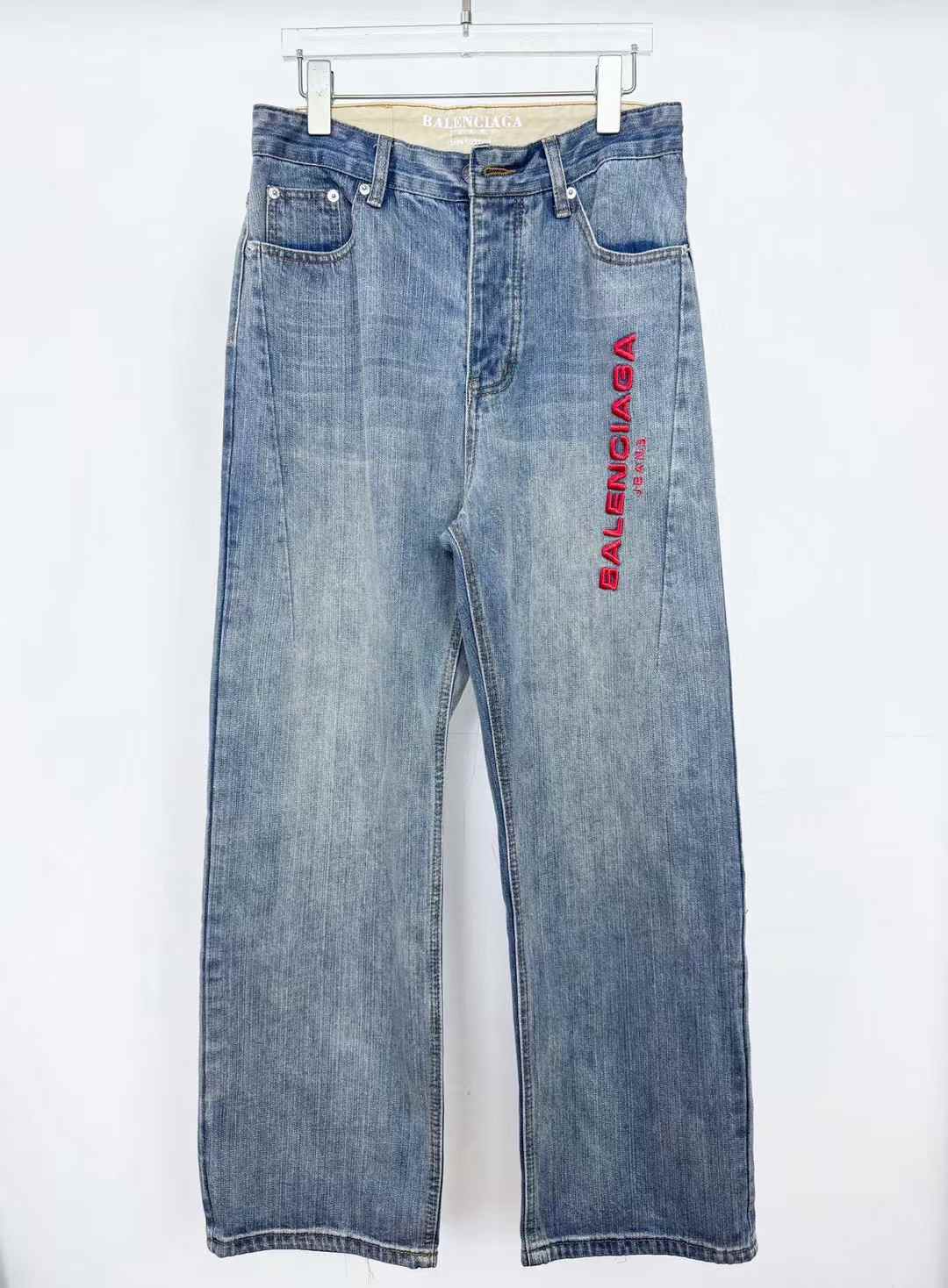 Balenciaga logo-embroidered wide-leg jeans in light washed blue denim