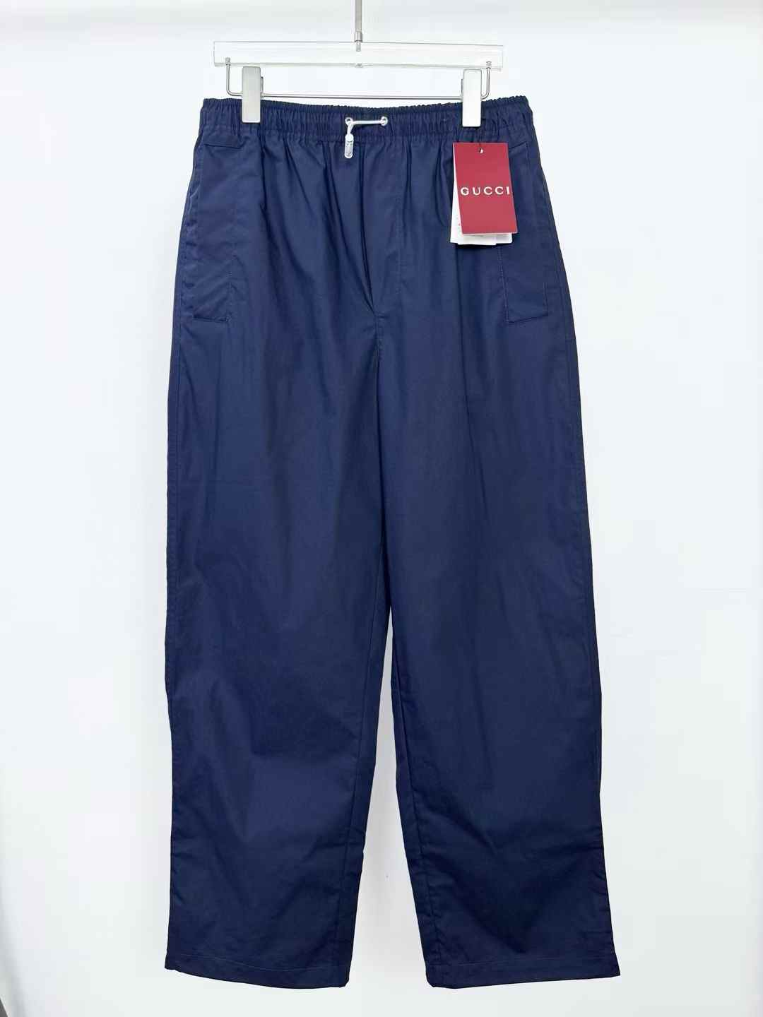 gucci navy blue pants with an elastic waistband and drawstring