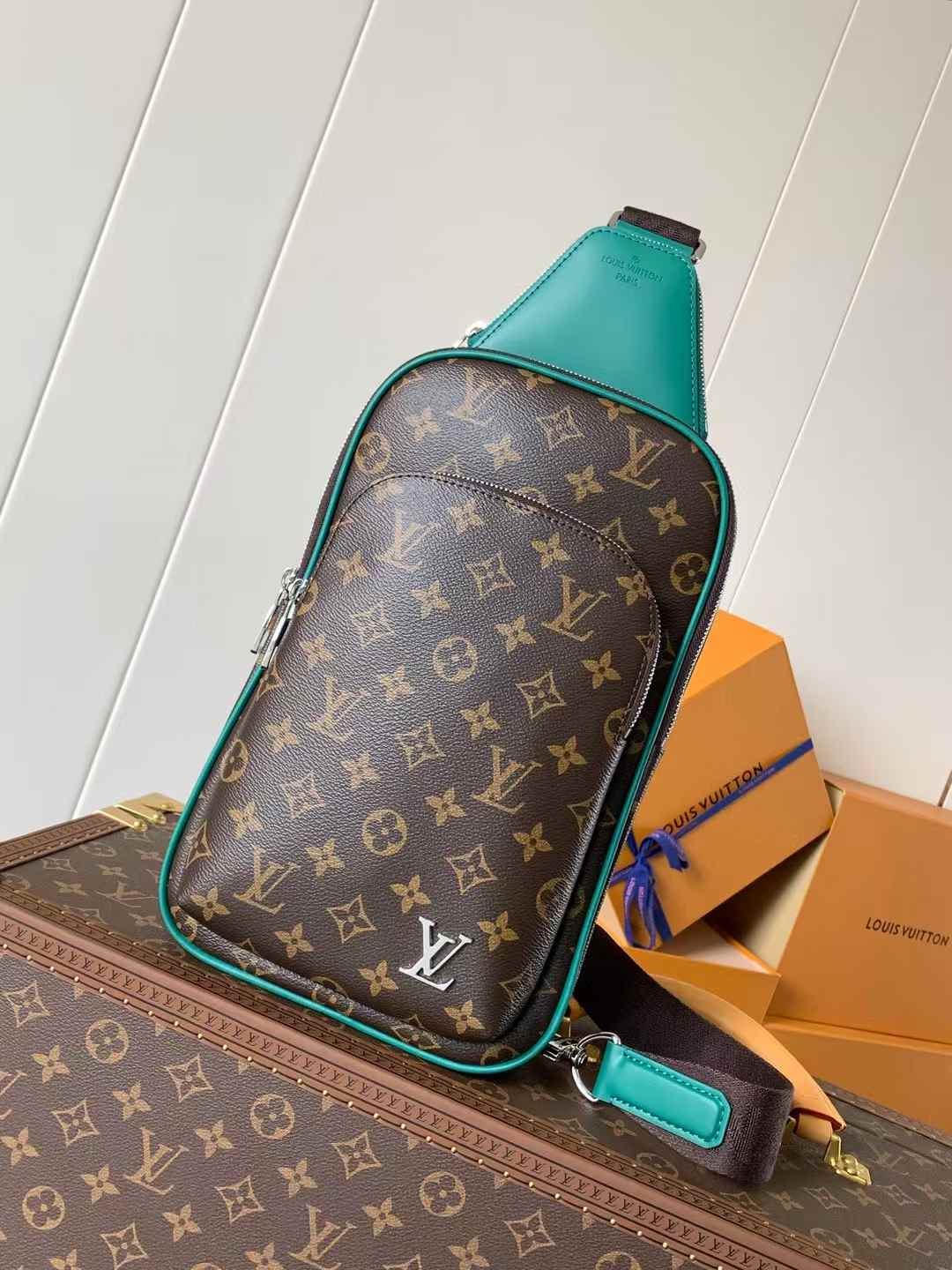 LV Avenue Slingbag in Monogram Macassar canvas with a green accent