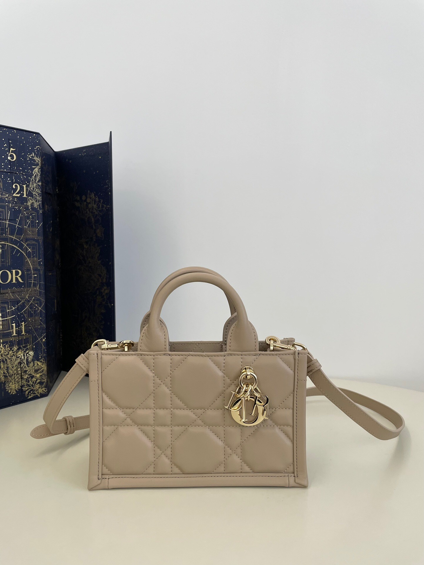 Dior Mini Dior Book Tote in powder beige Macrocannage calfskin