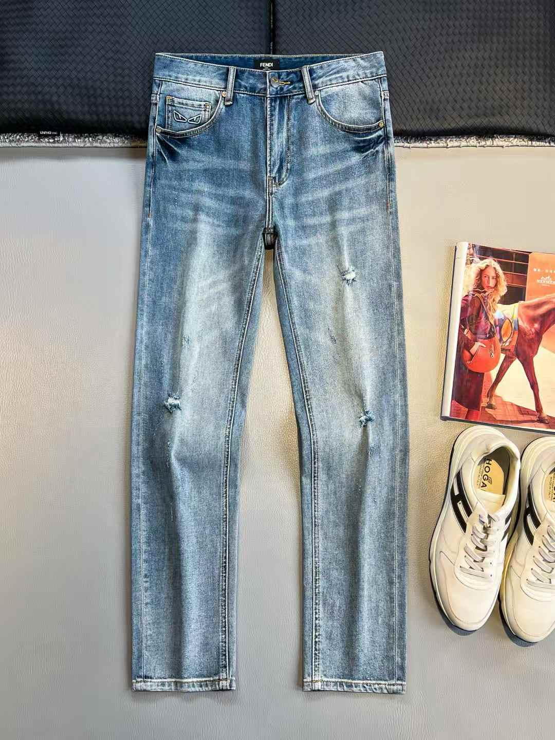 Fendi DEOTSY jeans for men in a slim fit with a mid-rise waist and a tapered leg