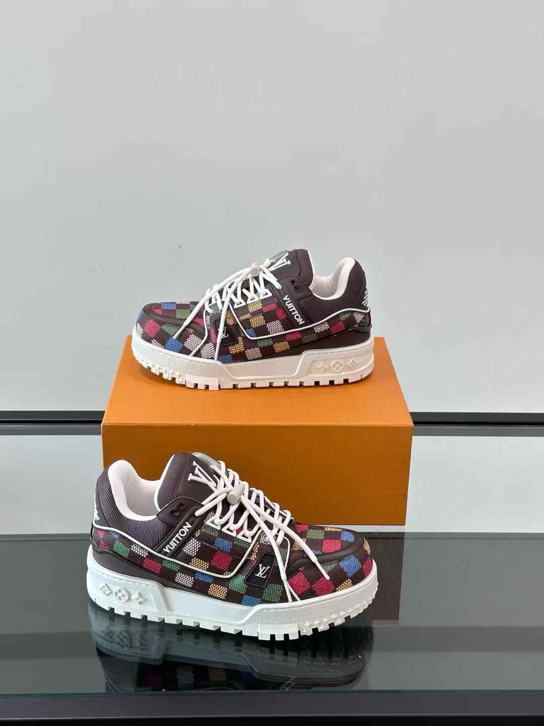 LV Trainer Maxi Sneaker in a multicolor Damier pattern
