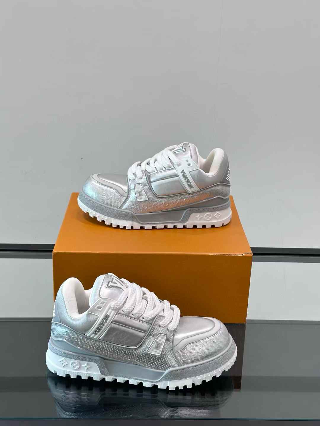 LV Trainer Maxi sneaker in black with a Damoflage pattern