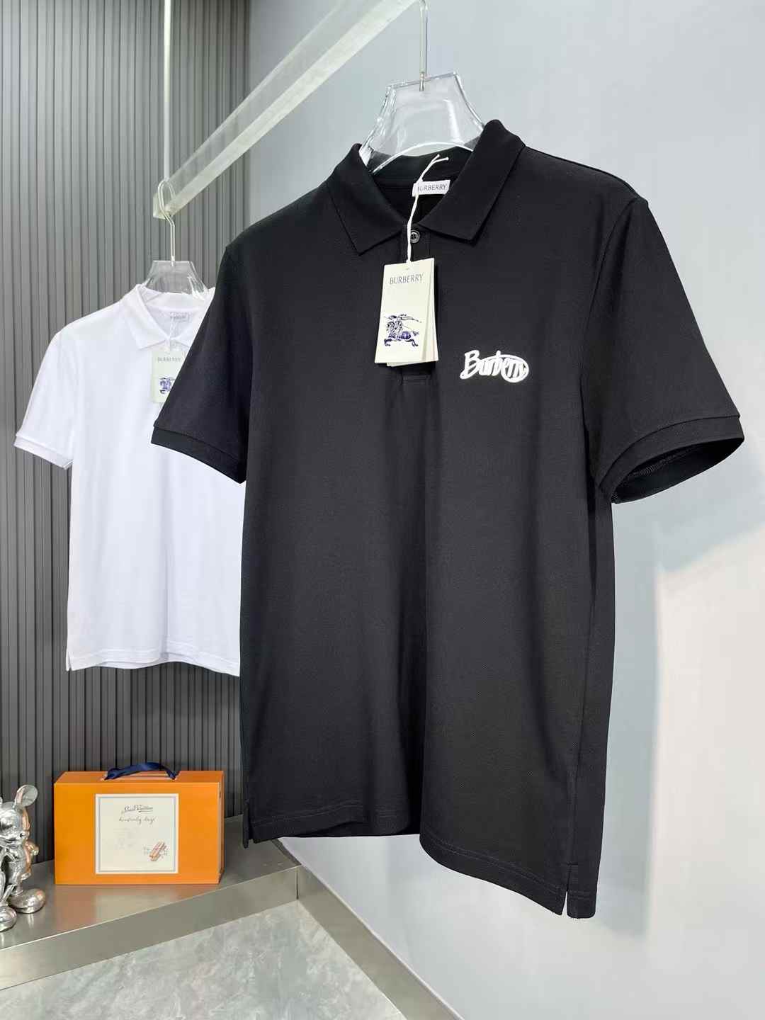 Burberry black cotton piqué polo shirt with an embroidered logo on the chest