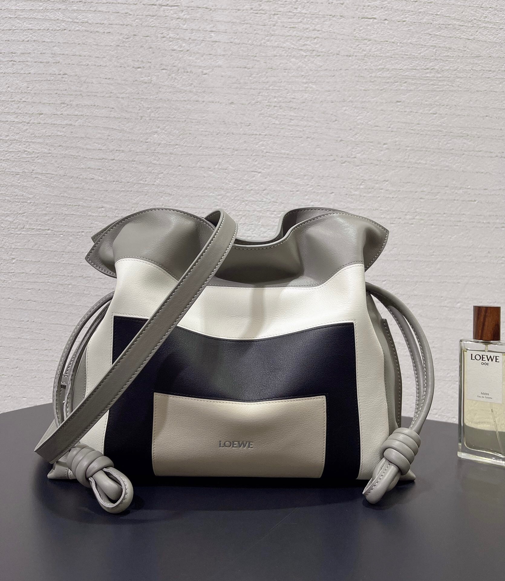 Loewe Flamenco Square clutch, a color-blocked leather shoulder bag with knot