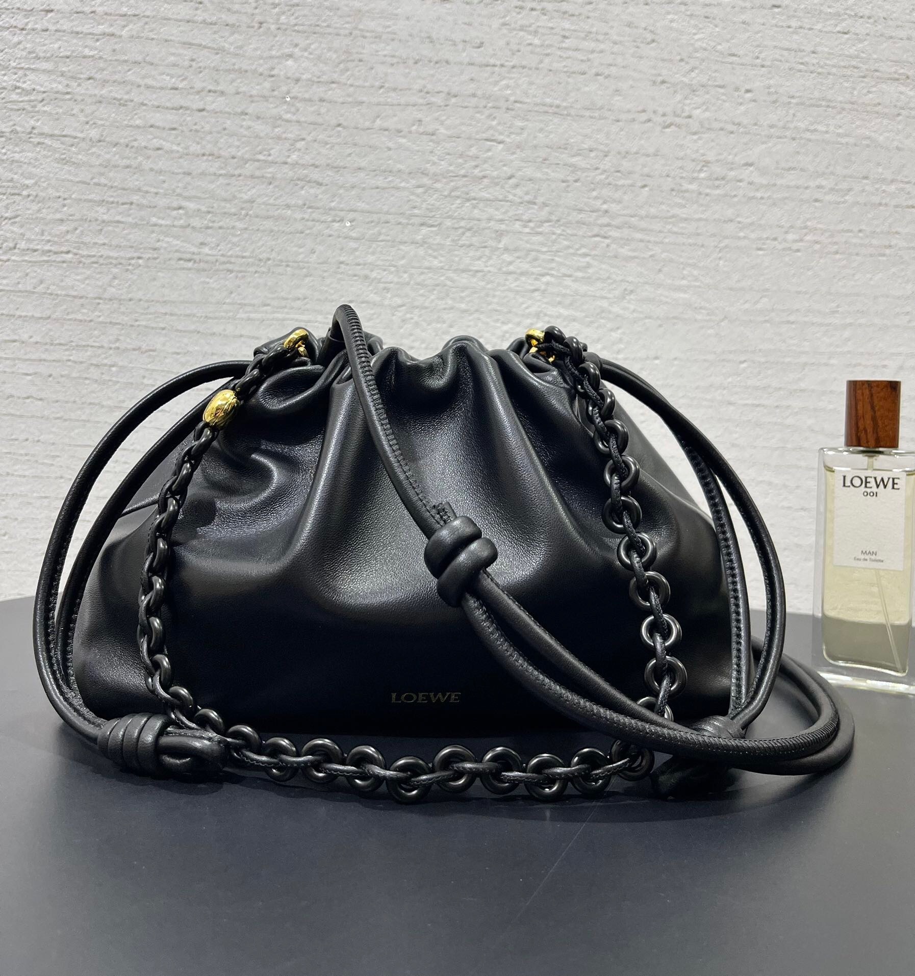 Loewe Flamenco purse in black mellow nappa lambskin leather with a donut chain strap