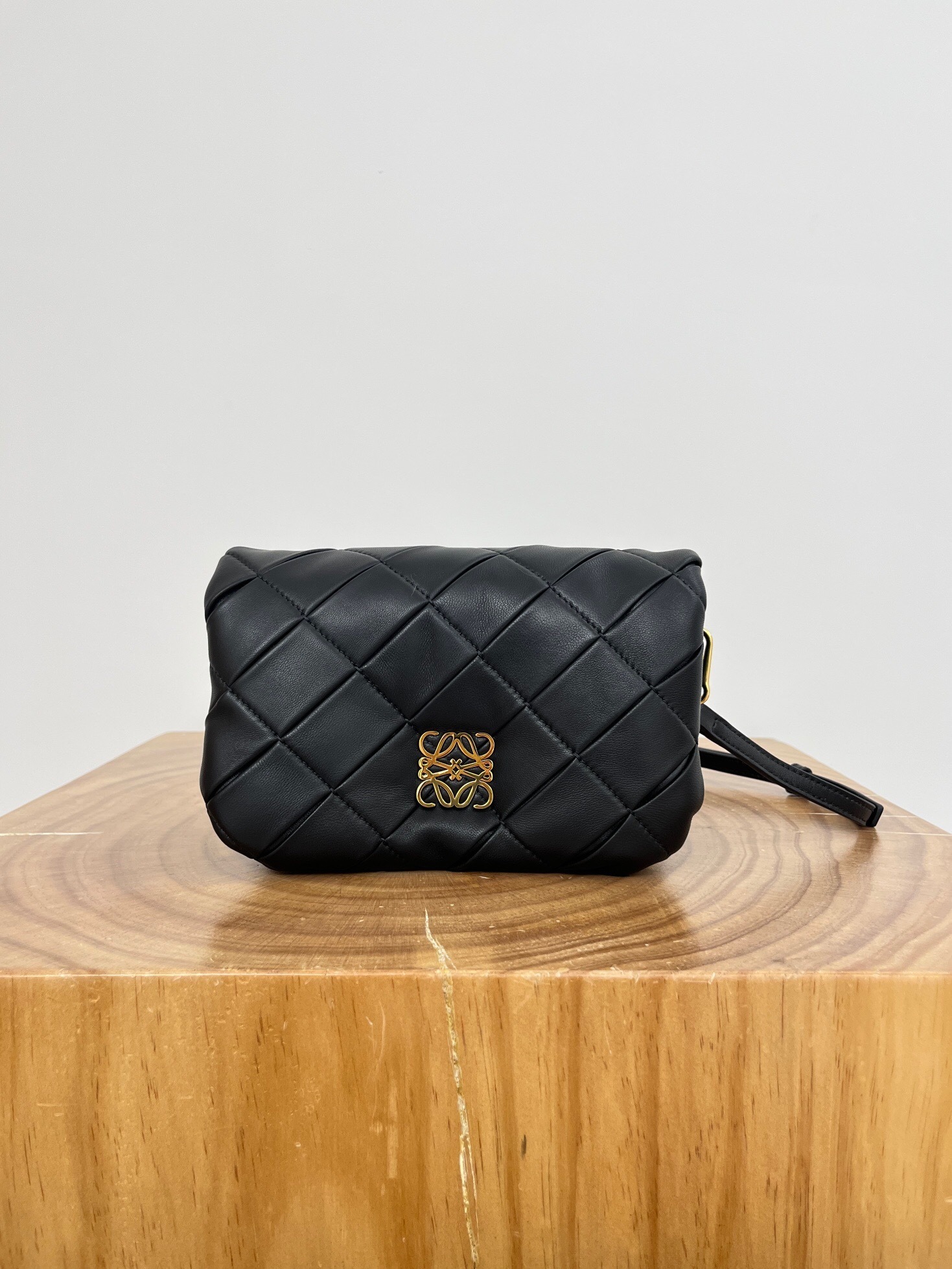 Loewe Goya Puffer mini bag in black pleated shiny nappa lambskin with gold-tone Anagram hardware