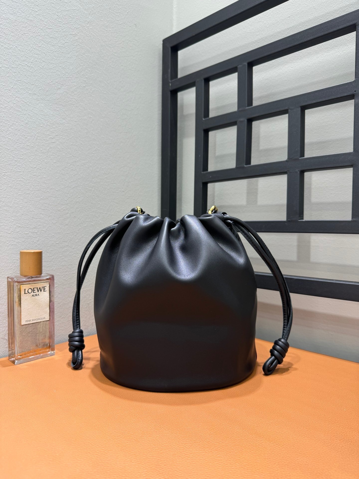 Loewe Flamenco bucket bag in black nappa lambskin leather with a logo strap