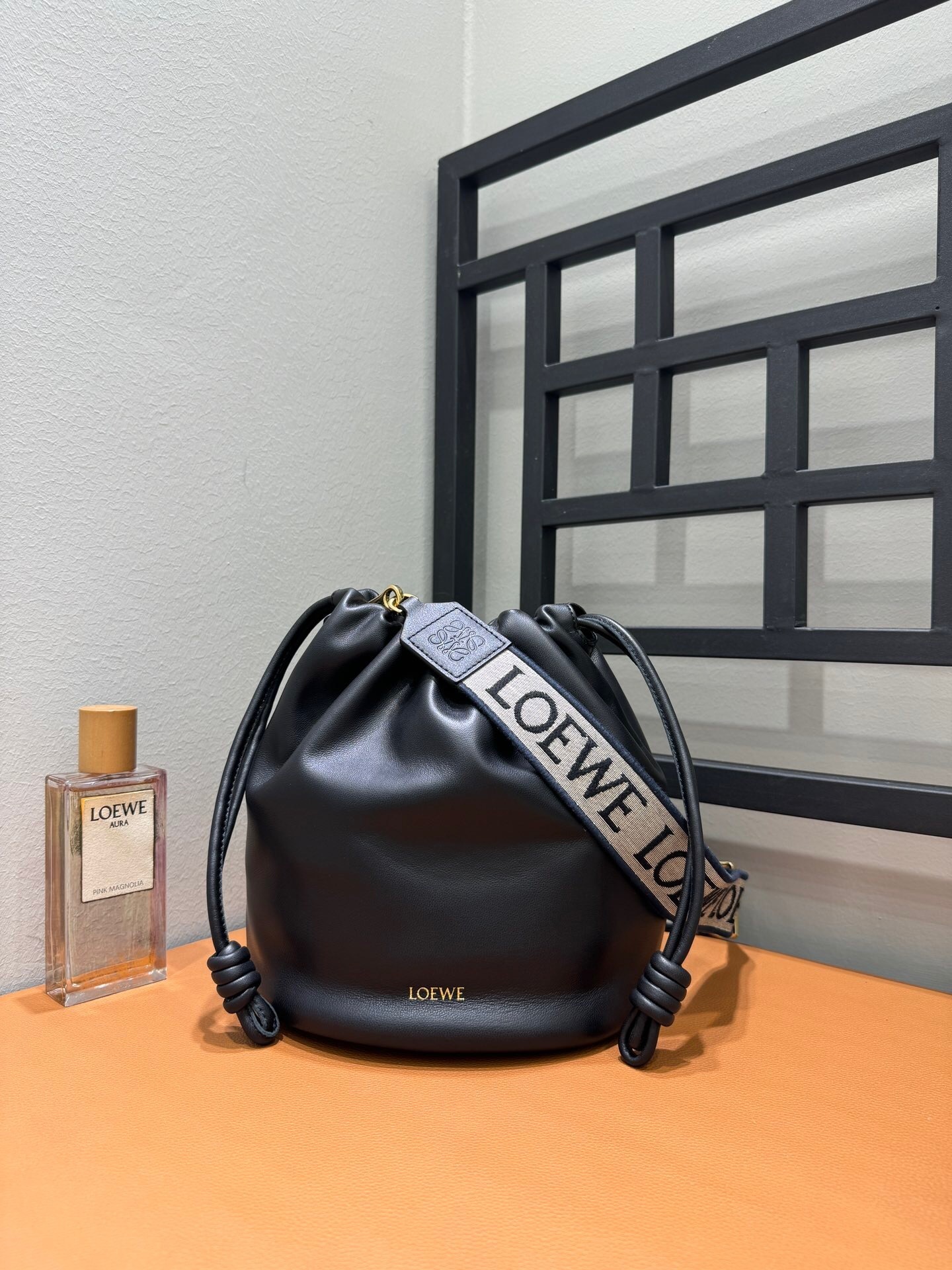 Loewe Flamenco bucket bag in black nappa lambskin leather with a logo strap