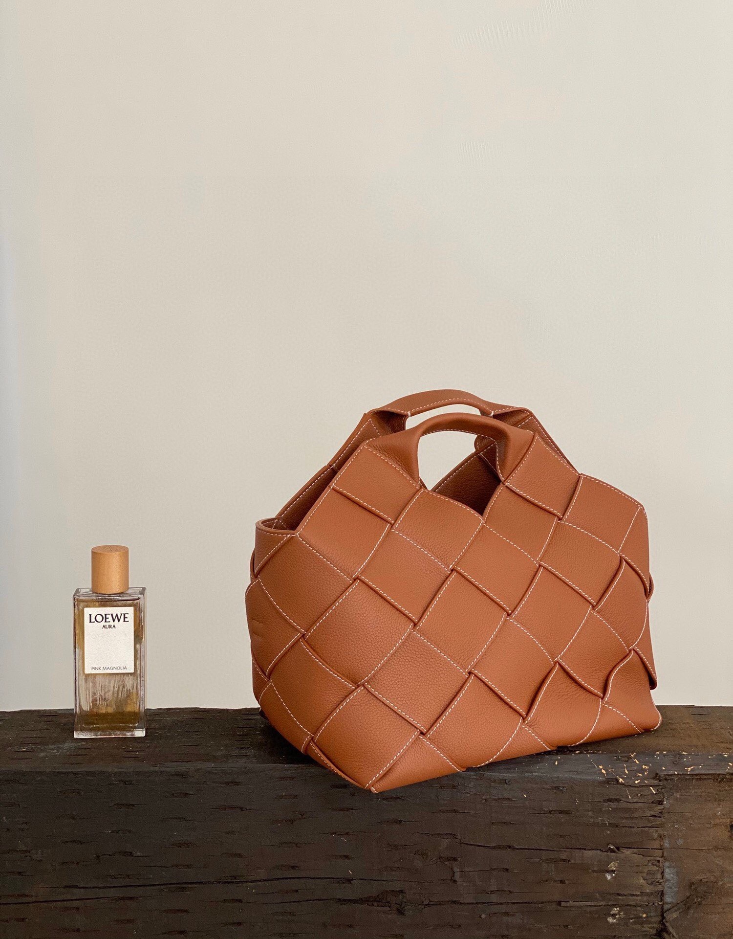 Loewe Small Surplus Leather Woven basket bag in a brown calfskin