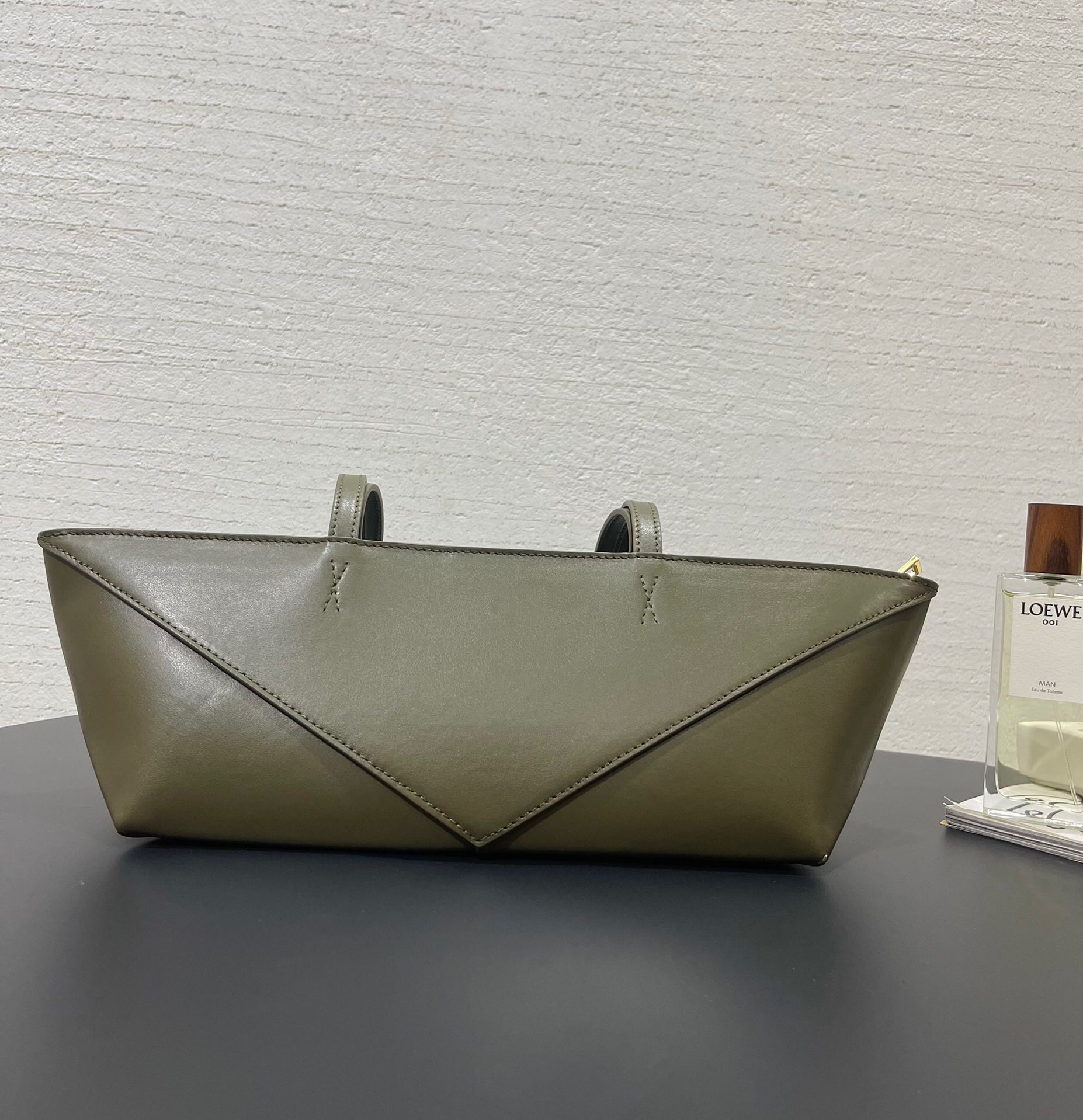 Loewe Medium Puzzle Fold tote bag in shiny calfskin leather and a dark khaki green