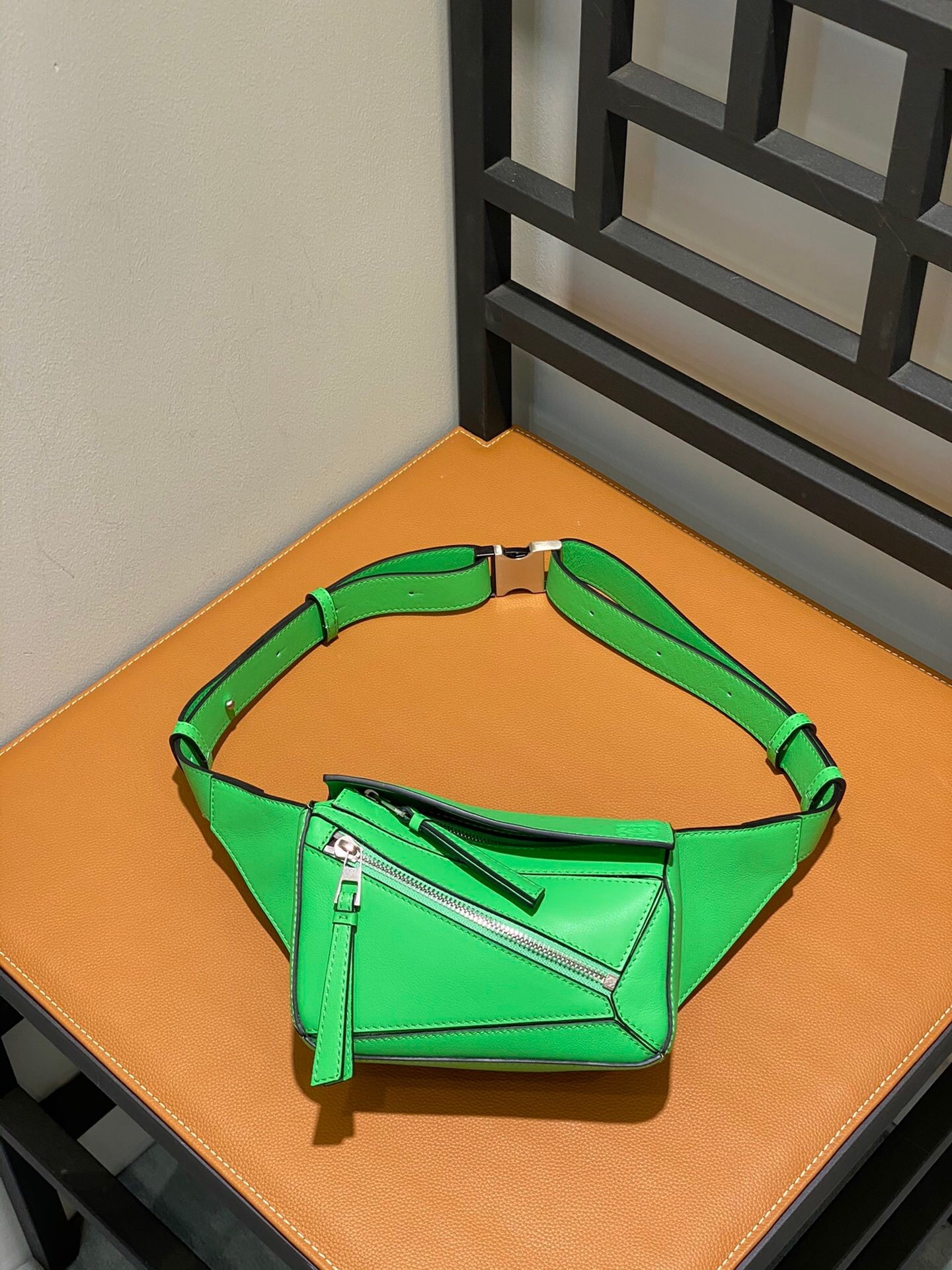 Loewe Mini Puzzle Bumbag in green calfskin leather
