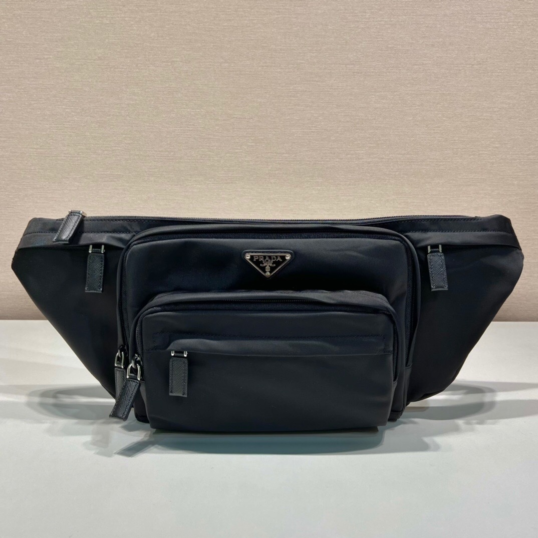 Prada Re-Nylon belt bag crafted with Saffiano leather trim and has an internal zip pocket