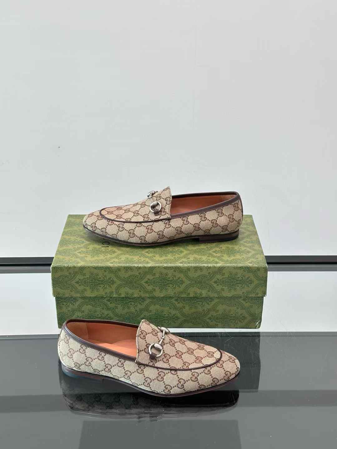 Gucci Jordaan loafer in beige and ebony GG canvas