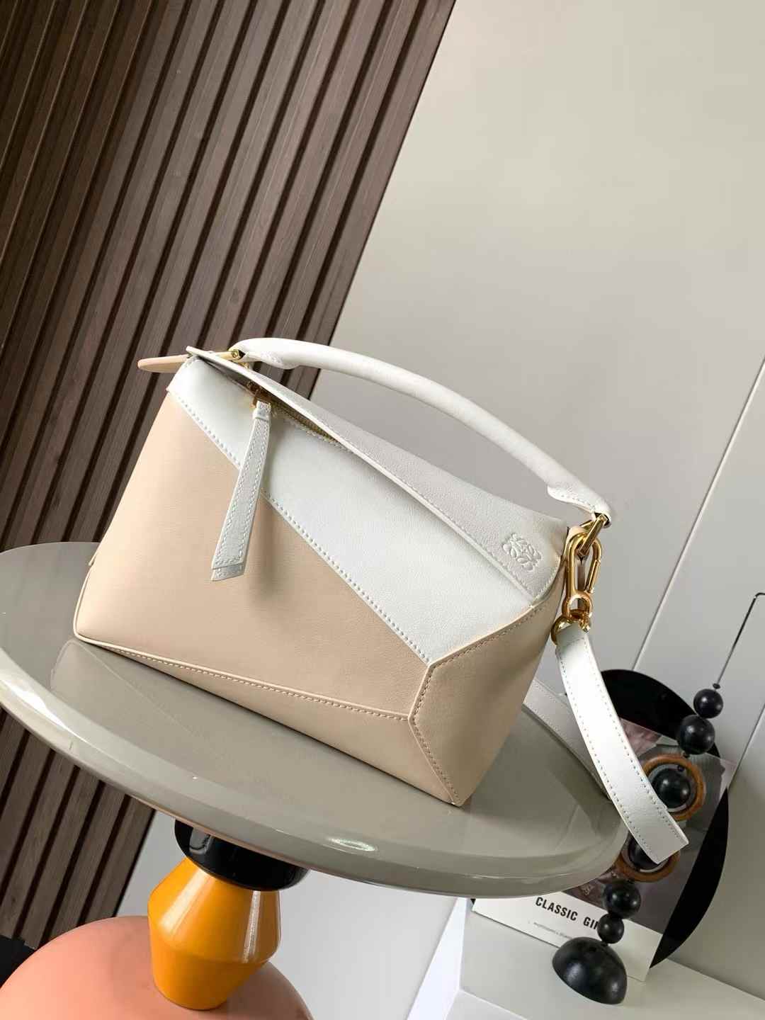 Loewe Small Puzzle Edge Bag in classic calfskin in a two-tone color of white and paper