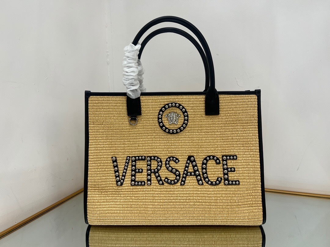 Versace La Medusa raffia tote bag with black leather trim and stud embellishments