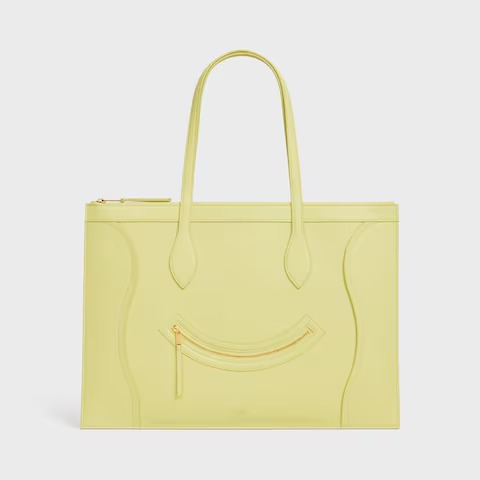 Celine Flat Cabas New Luggage bag in glossy calfskin in the color Citrus.