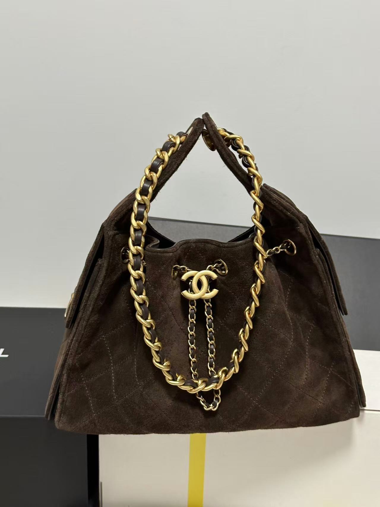 Chanel 25 Small Hobo Bag in dark brown suede with antique gold hardware