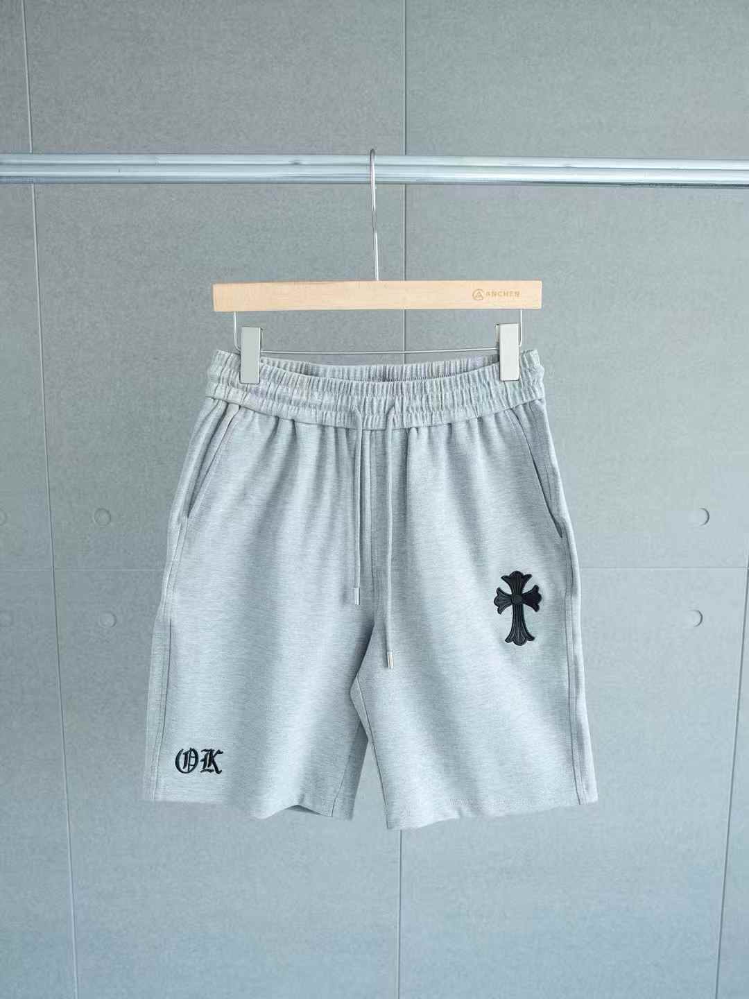 Chrome Hearts sweatpants with a cross patch design White