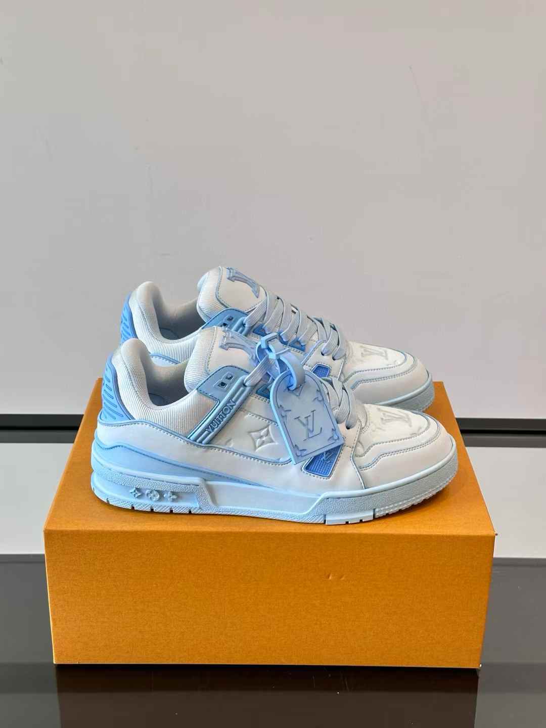 LV Trainer Low sneaker in white and sky blue