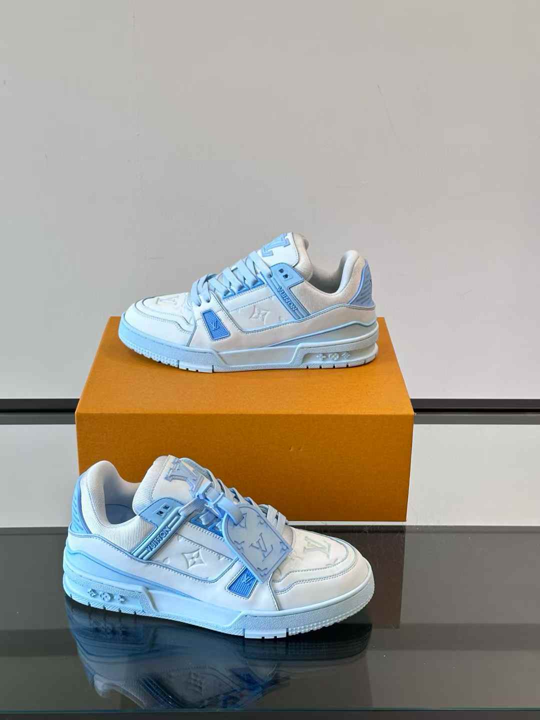 LV Trainer Low sneaker in white and sky blue