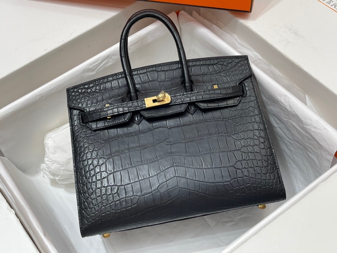 Hermes Birkin bag made from crocodile or alligator leather with gold hardware