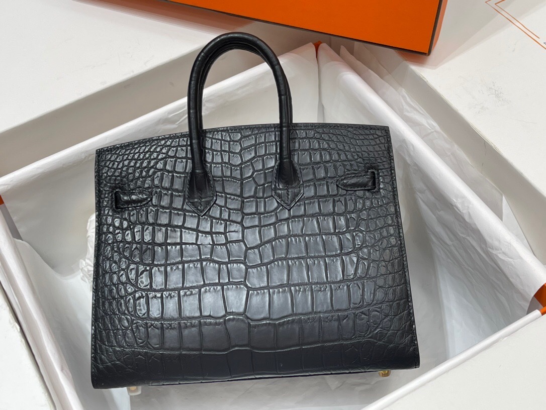Hermes Birkin bag made from crocodile or alligator leather with gold hardware
