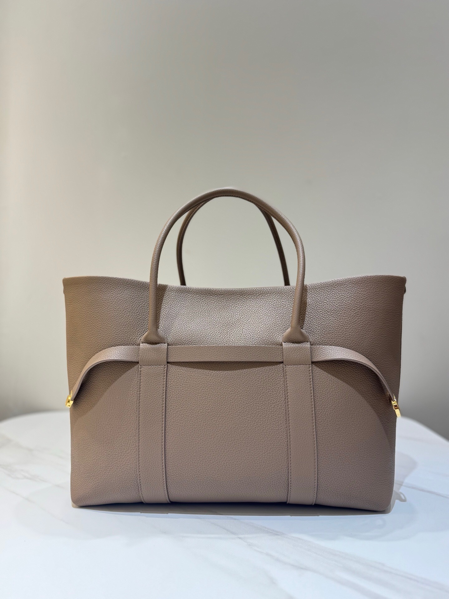Loro Piana Ghiera large shopper bag in fine-grained calfskin leather, likely in the Fume Taupe/Sun Gold color variant
