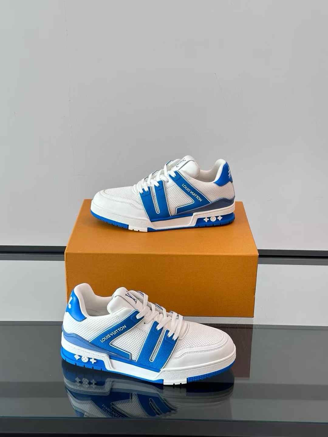 LV Trainer Sneaker in white and blue calf leather