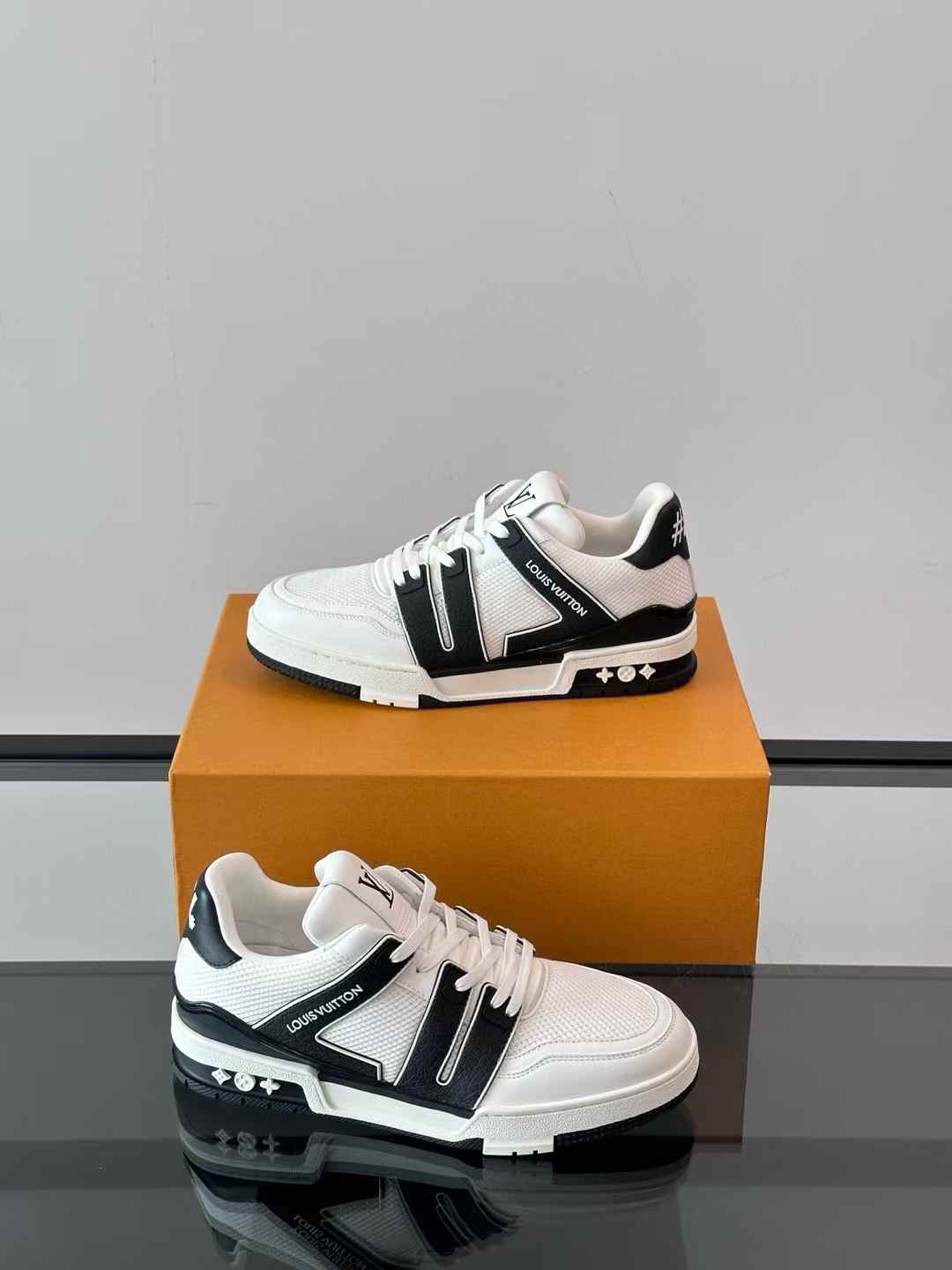 LV Trainer sneaker in white and black leather