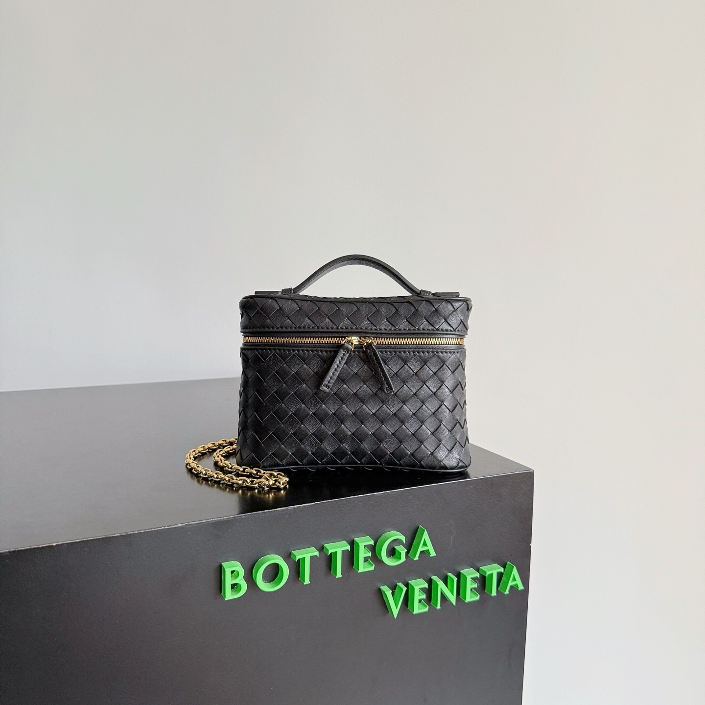 Bottega Veneta Bang Bang Intrecciato leather vanity case in black with gold-finish hardware