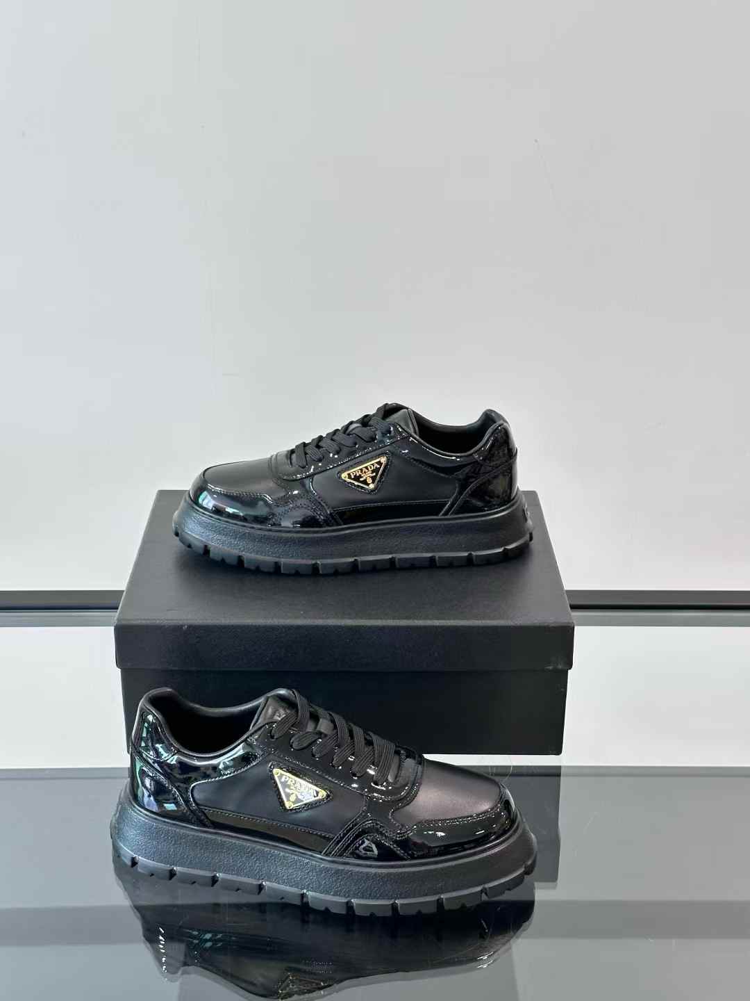 Prada patent leather sneakers with a chunky rubber sole Black