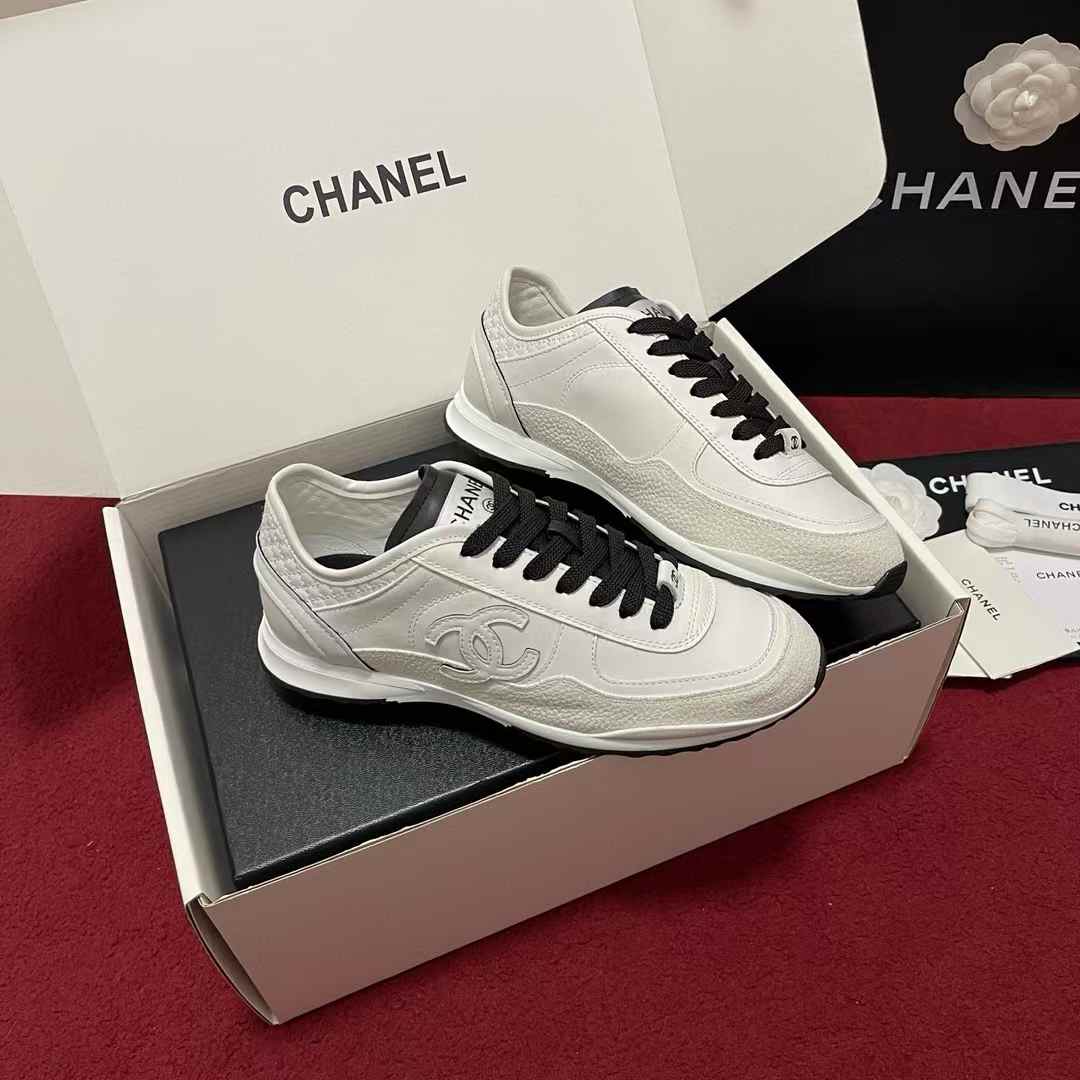 Chanel Calfskin & Suede Calfskin Trainers sneakers in white and black
