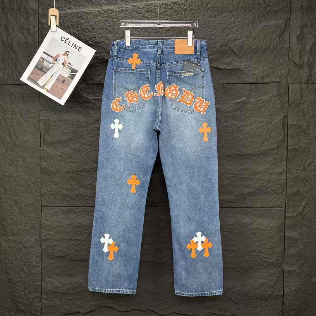 Chrome Hearts women's blue jeans with orange and white cross patches