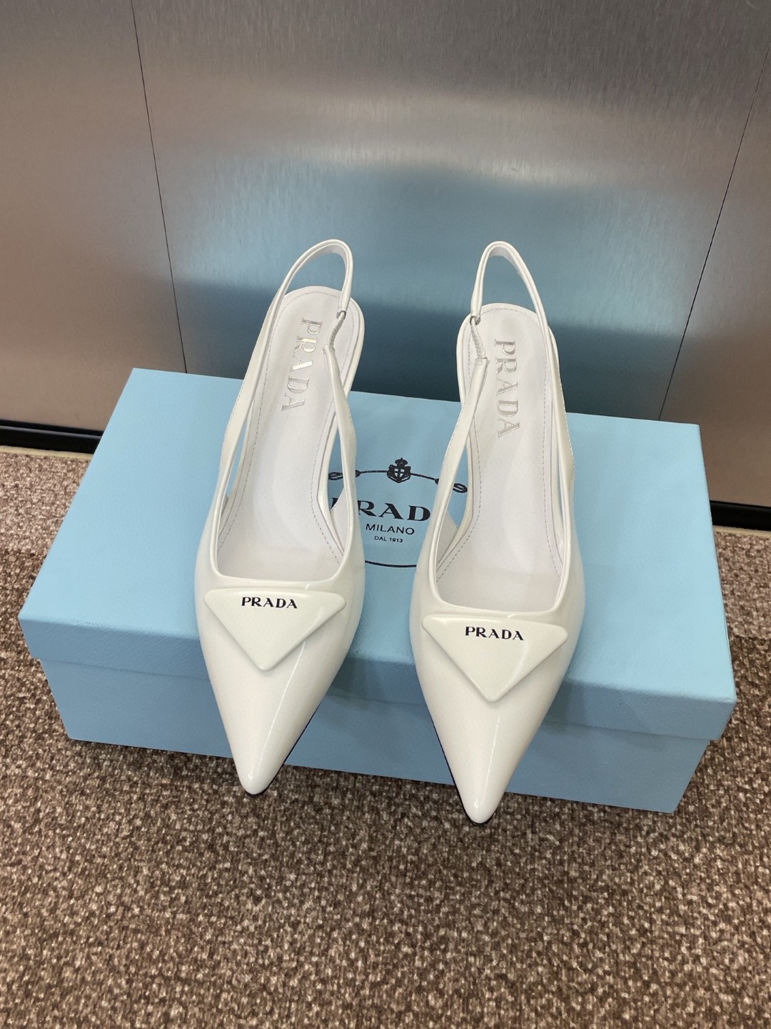 Prada brushed leather slingback pumps White