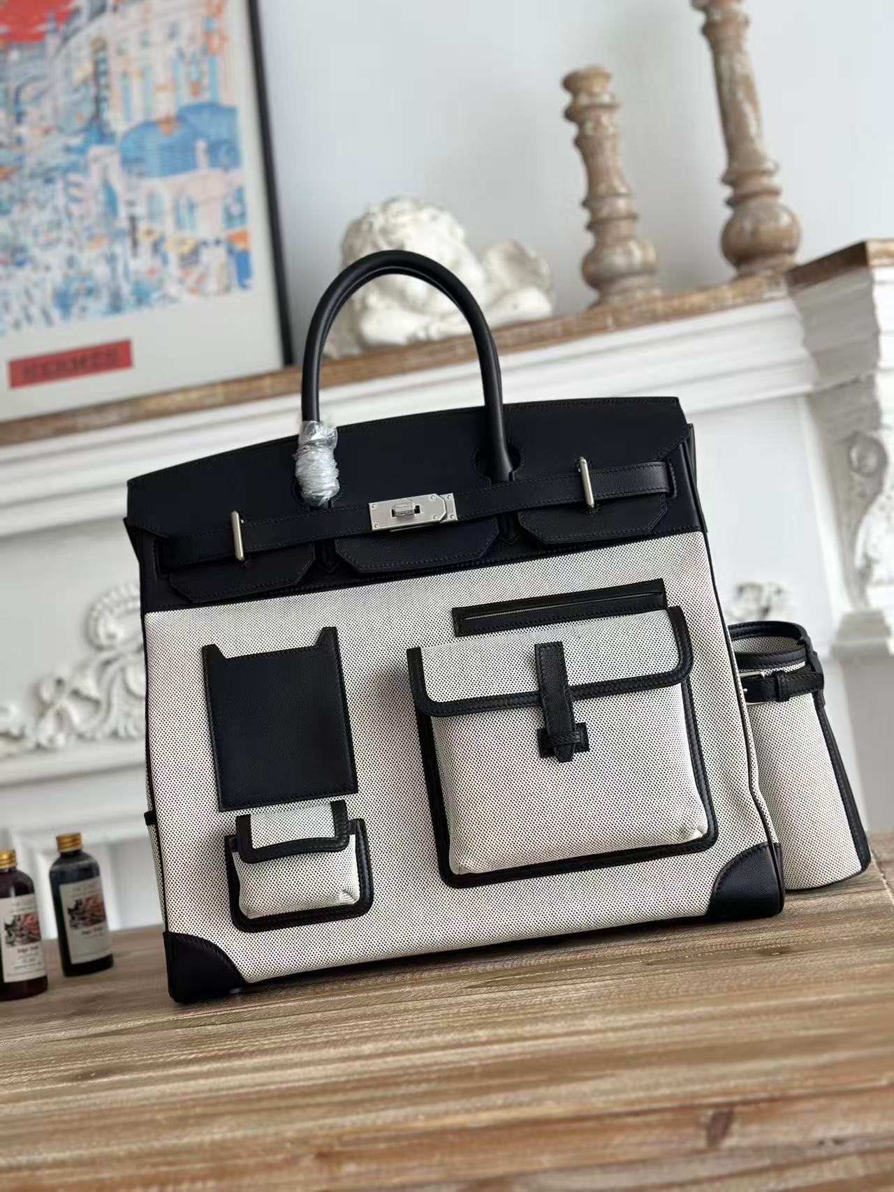 Hermes Birkin HAC 40 Cargo bag in Noir Evercalf leather and Ecru Toile with palladium hardware
