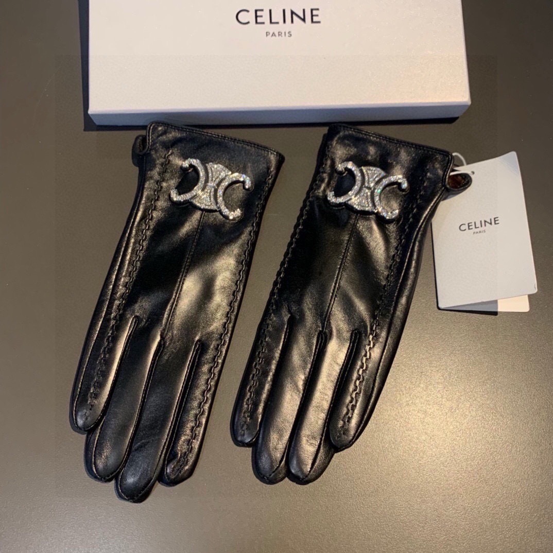 Celine pair of black leather gloves with a Celine Triomphe logo embellishment