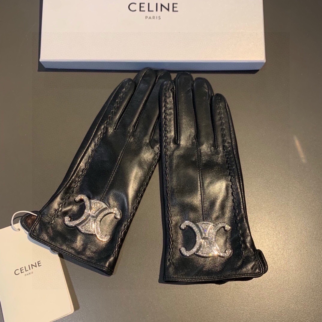 Celine pair of black leather gloves with a Celine Triomphe logo embellishment