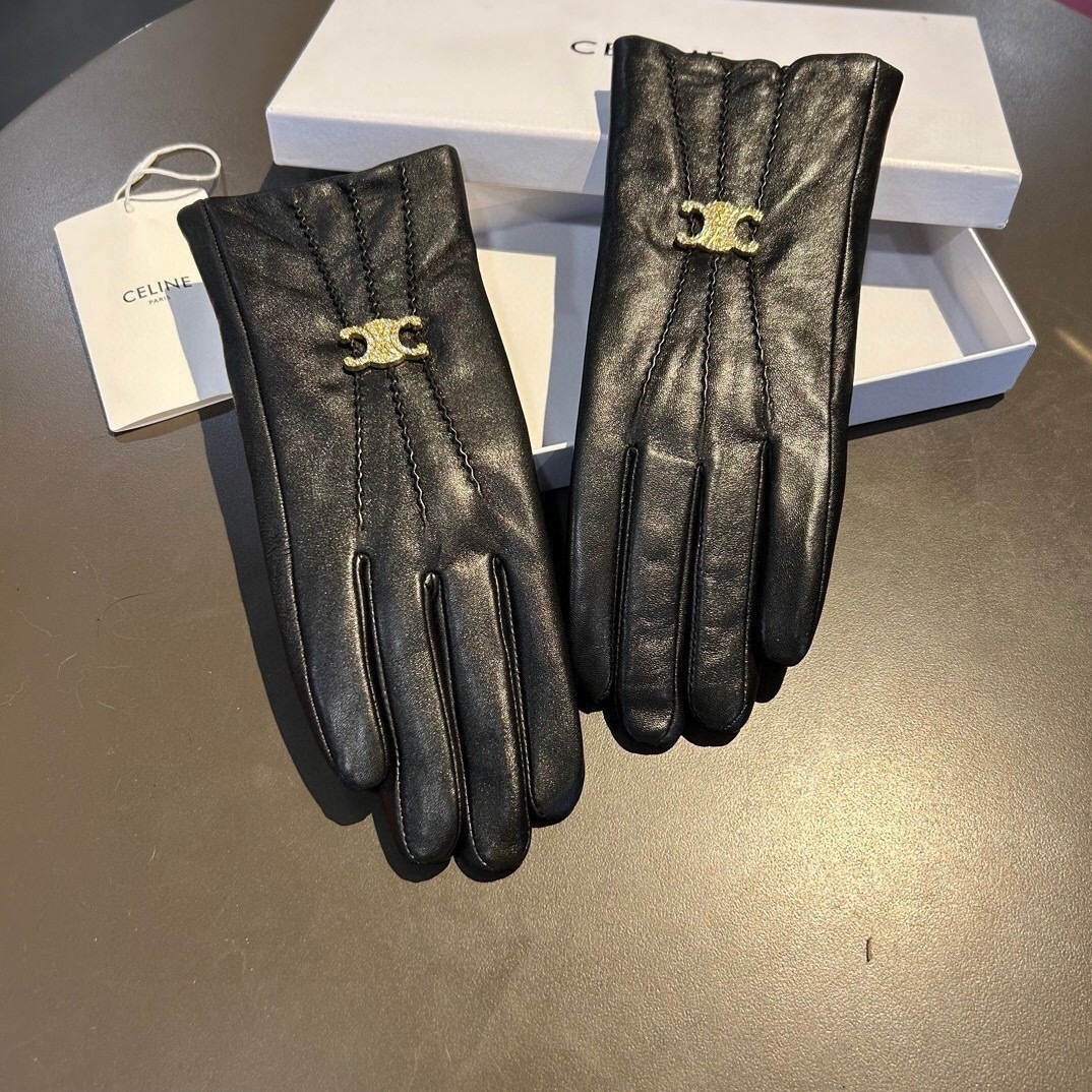 Celine pair of Celine Triomphe gloves in black plongé lambskin, featuring a gold-plated Celine monogram
