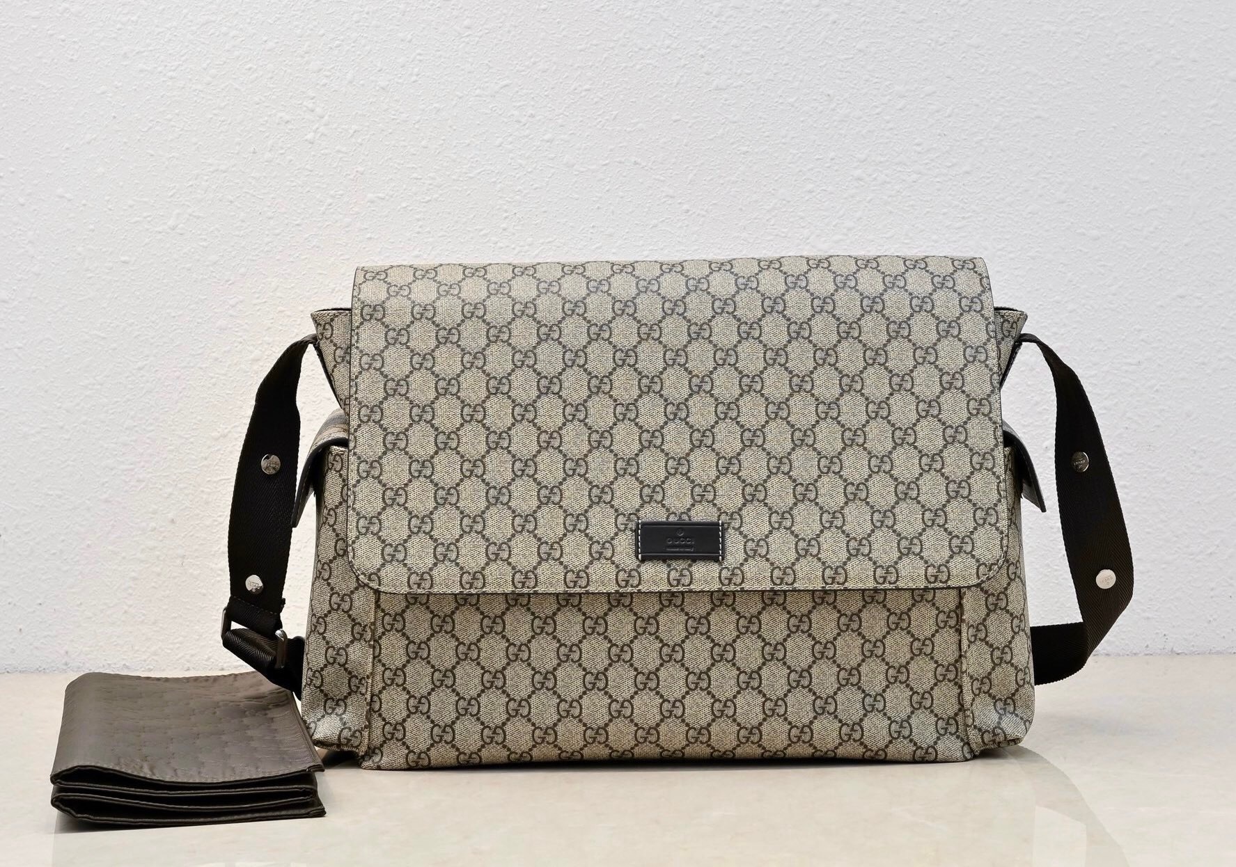 Gucci Ophidia printed coated-canvas diaper bag in brown on beige GG monogram