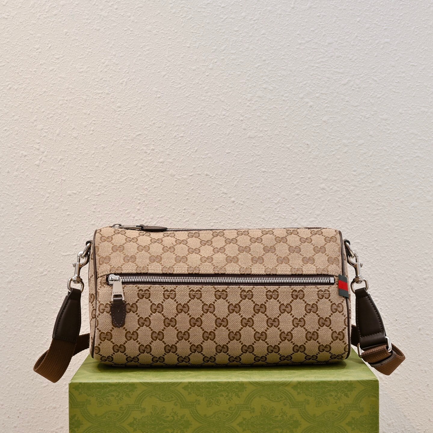 Gucci GG-canvas small cylinder or crossbody bag with dark brown leather trim and a green and red