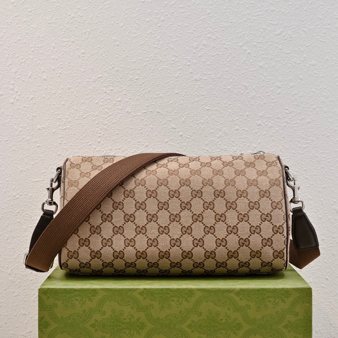 Gucci GG-canvas small cylinder or crossbody bag with dark brown leather trim and a green and red