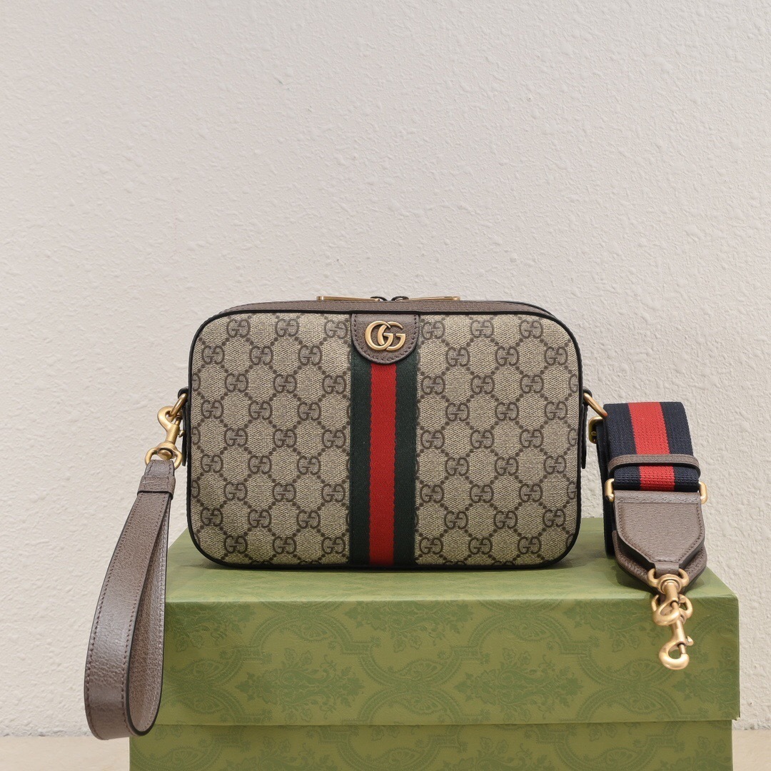 Gucci Ophidia GG small camera crossbody bag in beige GG Supreme canvas with brown leather trim and a red and blue Web stripe