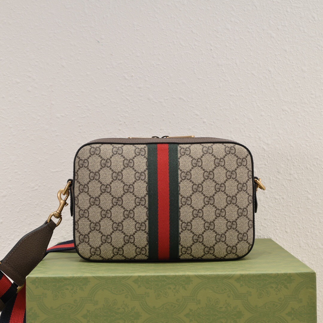 Gucci Ophidia GG small camera crossbody bag in beige GG Supreme canvas with brown leather trim and a red and blue Web stripe