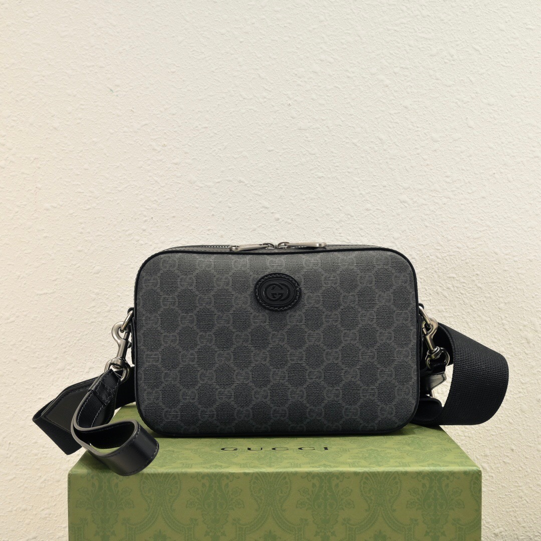 Gucci GG Supreme shoulder bag with tonal leather trims and an adjustable shoulder strap black