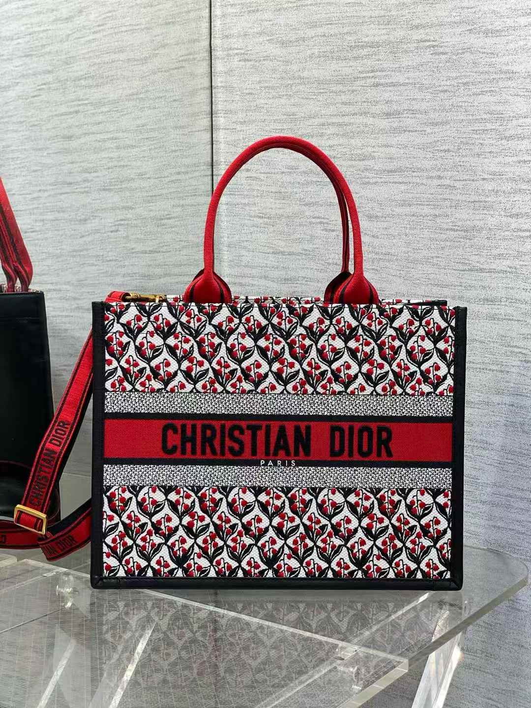 Dior Book Tote bag in a red and white Dioramour motif embroidery