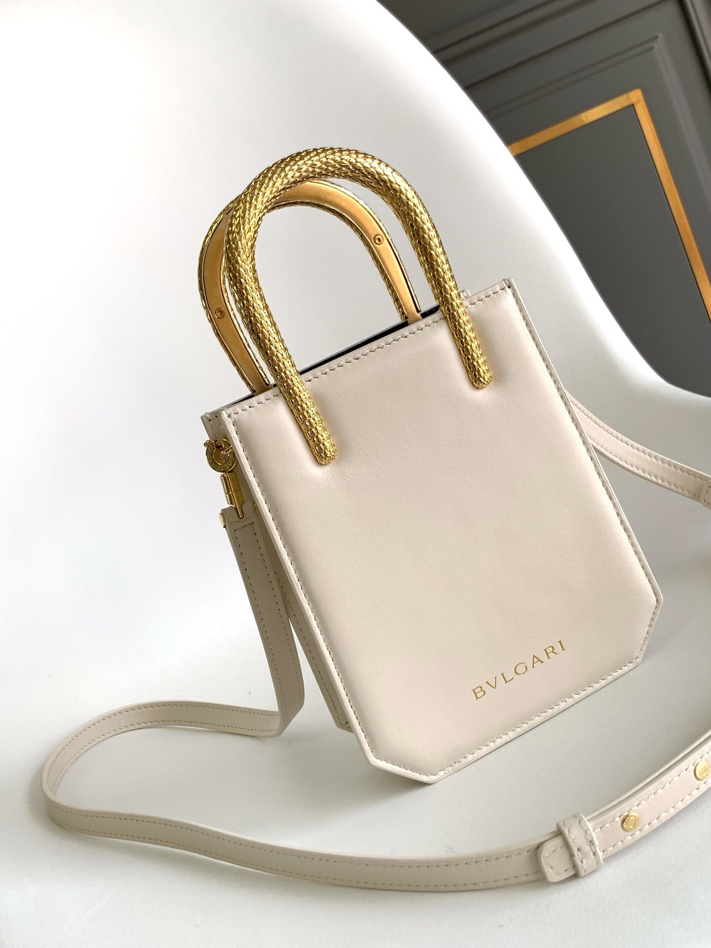 Bvlgari Serpentine mini tote bag in ivory opal calf leather with gold-toned snake-shaped top handles