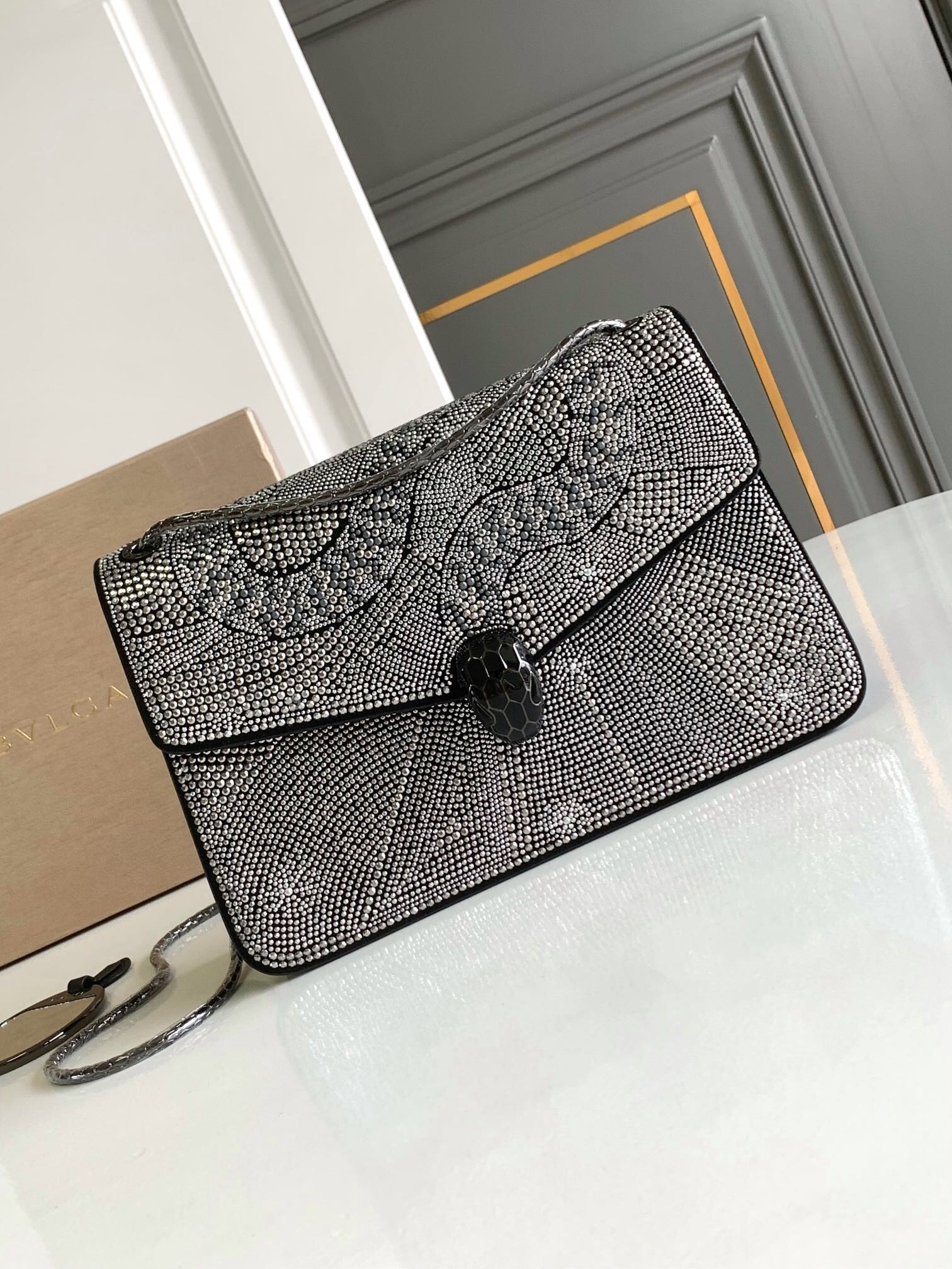 Bvlgari Serpenti Forever shoulder bag in a black/silver tone with a crystal or rhinestone-encrusted finish