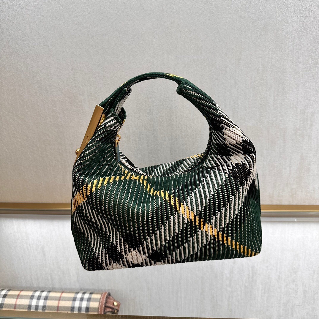 Burberry Mini Peg Duffle Bag in the green check pattern, made from polyamide with gold-tone hardware