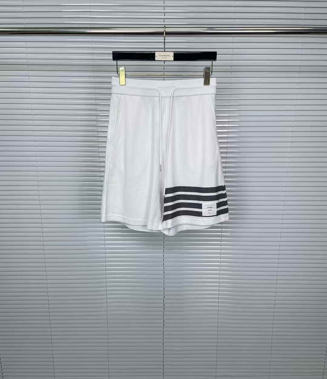 Thom Browne 4-Bar stripes shorts in white cotton pique
